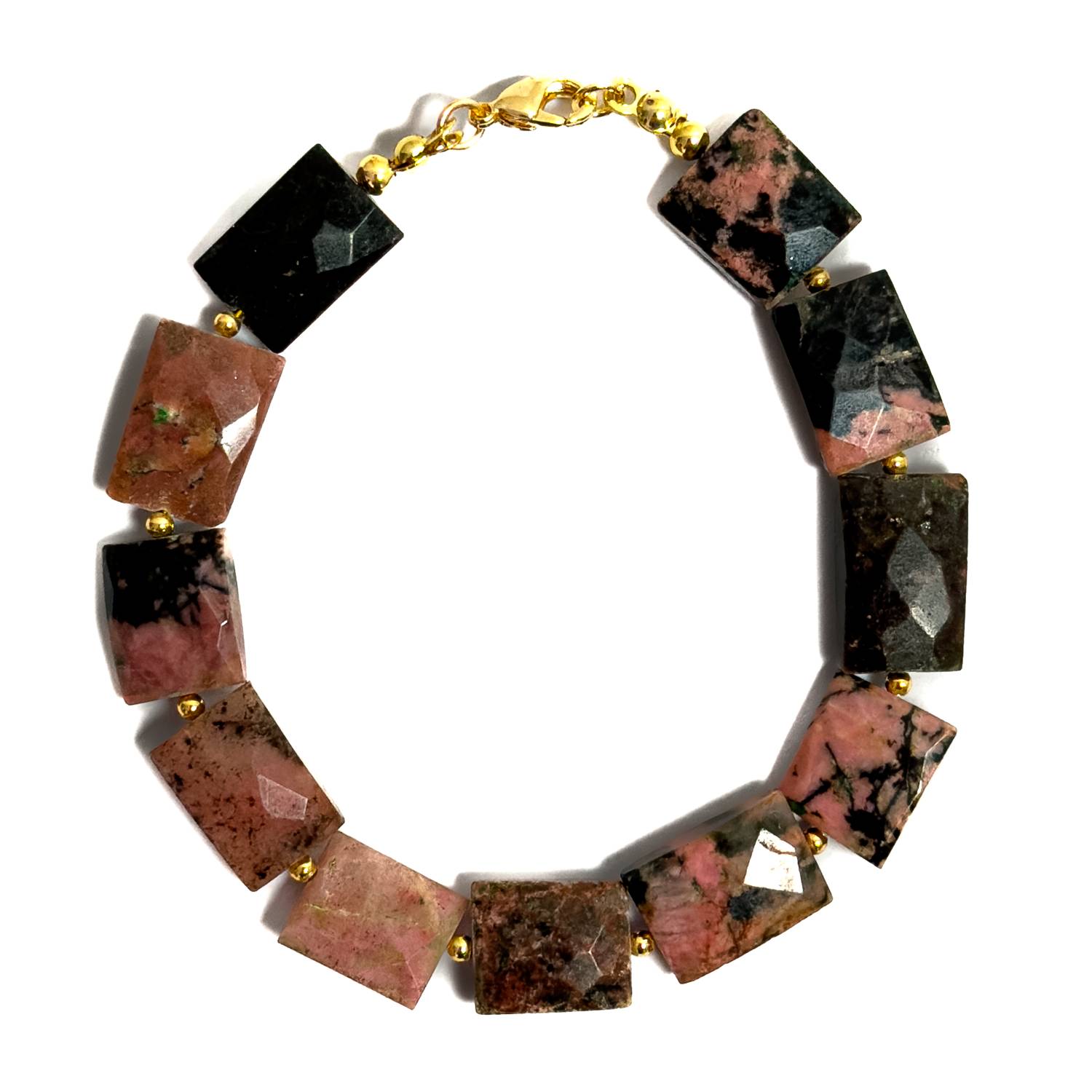 Pulsera artesanal MAVIS elaborada con bloques facetados de Rodonita natural en tonos rosados con vetas negras y broche dorado