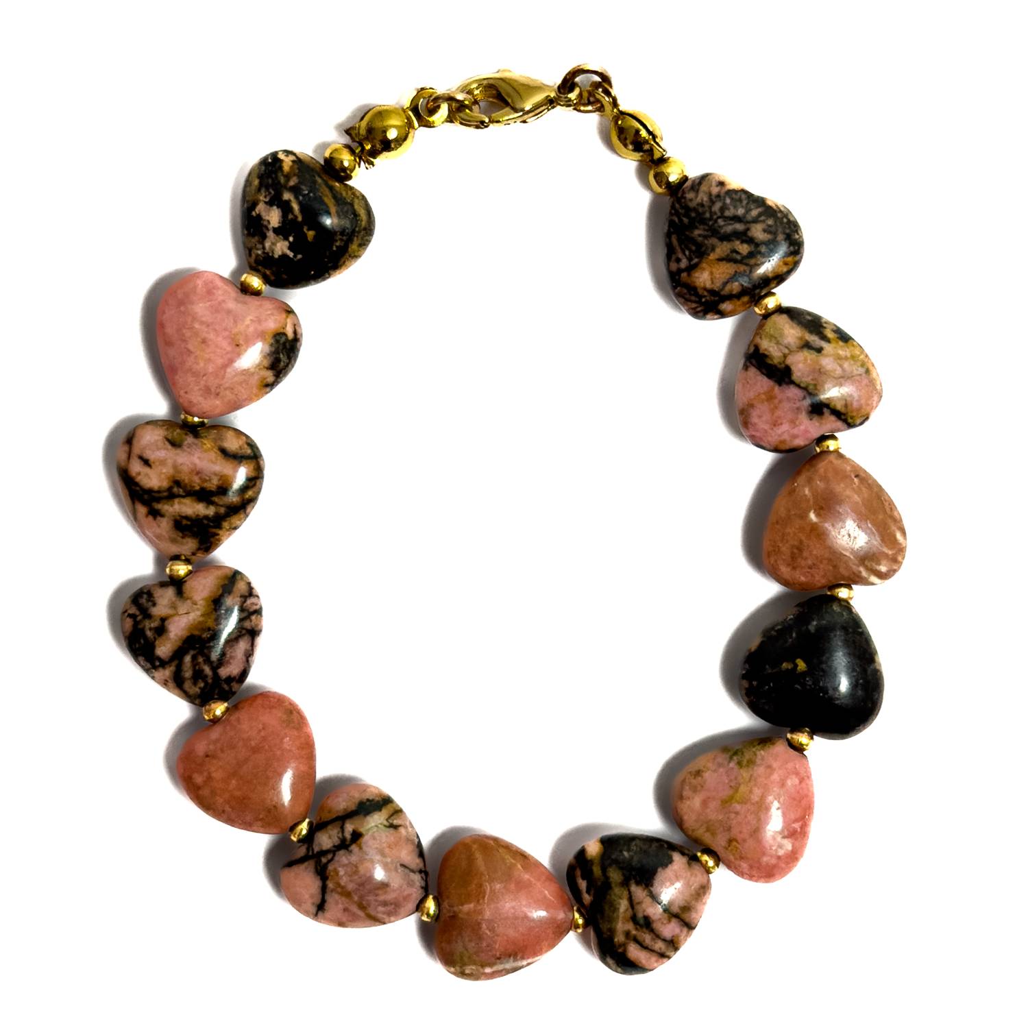 Pulsera artesanal MAVIS elaborada con corazones de Rodonita natural en tonos rosados con vetas negras, separadores dorados y broche con baño dorado.